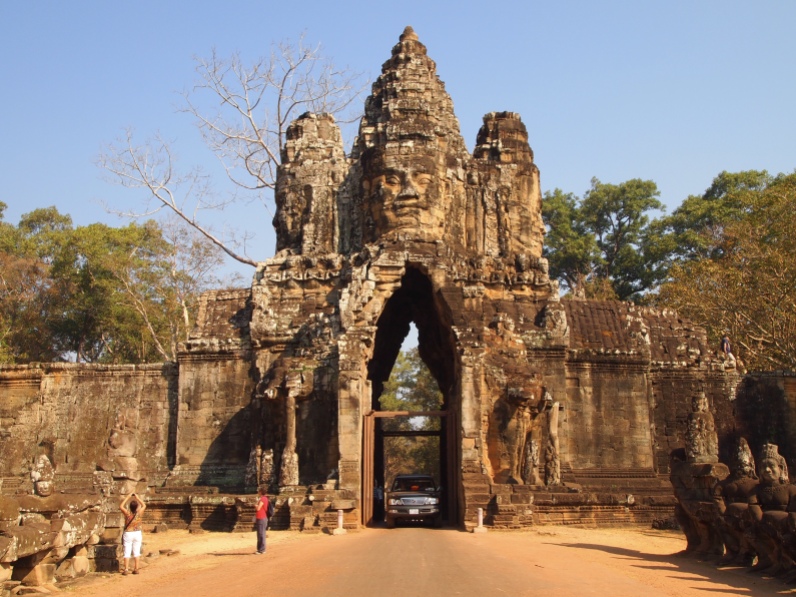 the east gate of angkor thom, flanked by 54 gods and 54 demons