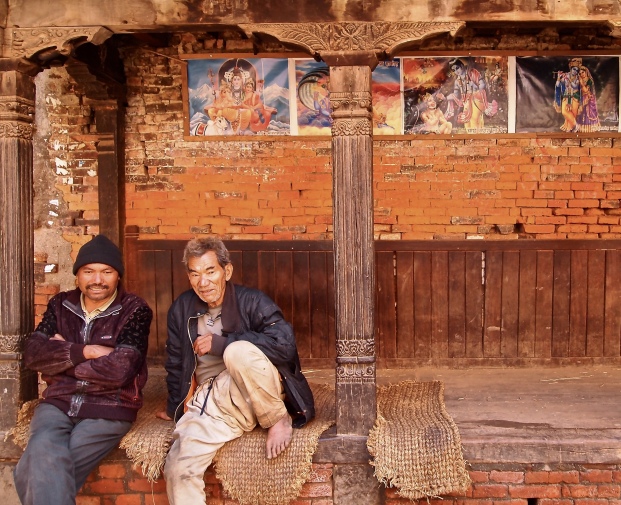 two Nepalis with movie posters