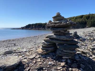 cairn-dotted rocky beach